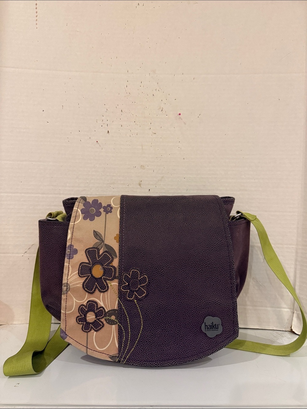 New without Tags - Haiku Plum and Green Floral Crossbody Bag.
